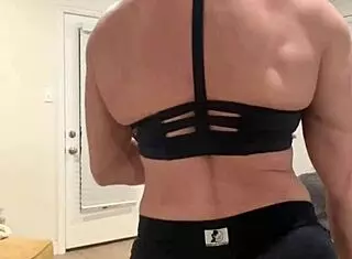 Amateur mature blonde babe flexes muscles in big tits milf solo