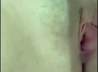 Blonde beauty spreads her legs wide to reveal pink vagina details up close in explicit display with latina flair