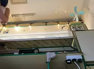 This super sexy slim eighteen-year-old chick is working in pear thongs and going braless outdoors.