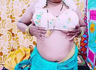 desi bhabhi casually shows off her big boobs and fingers wet pussy while chatting dirty in solo masturbation session on the bed