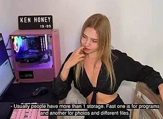 Blonde girl teases seductively on camera outdoors with panties showing.