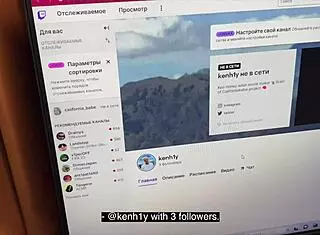 Blonde girl teases seductively on camera outdoors with panties showing.