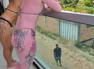 Why can't these two hotties inflate the mattress alone? They get help from a talented man walking by!