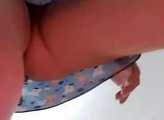 Neighbor without panties climbs onto the roof while sneaky neighbor watches her big shaved pussy from below during solo masturbation