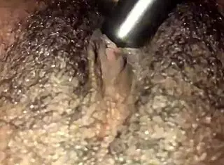 so this ebony chick starts playing with her wet hairy pussy at home. she rips clothes for solo orgasm in dripping beaver action.