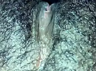 so this ebony chick starts playing with her wet hairy pussy at home. she rips clothes for solo orgasm in dripping beaver action.