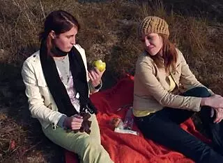 Outdoor Lesbian Kiss Sparks Strapon Passion