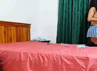 Busty housewife slips into student uniform. Reminisces slutty youth while fingering wet vagina.