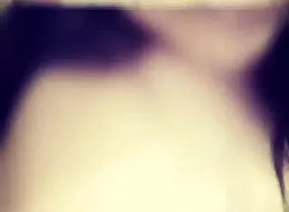 Marlene teases her juicy tits and ass