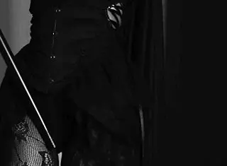 Petite ebony witch in fishnets teases heels before double insertion plunge