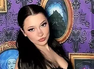 pigtails goth teen strips bra off slowly in haunted house bedroom music plays teasing