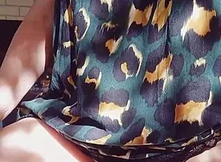 mature blonde's huge shaved cameltoe pussy flashes up close