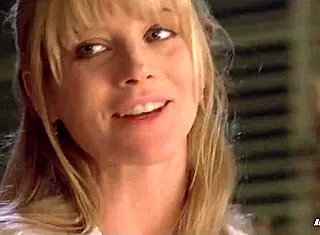 Janet Gunn bares small tits in Night of the Running Man