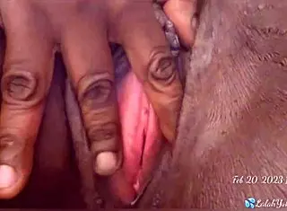 This milf fucks her pussy with a bottle.