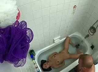 Teen 18+ asian girl in pool bathtub scene gets wet and wild