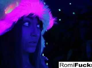 Watch Romi Rain and Dani unleash lesbian passion under black lights!