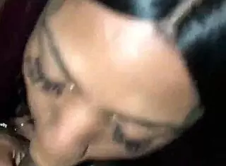 shemale performs blowjob on big black cock