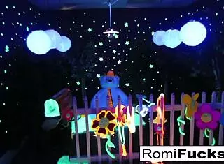 Watch Romi Rain and Dani unleash lesbian passion under black lights!
