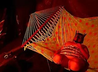 Amateur BBW fingering her wet pussy in a tent hammock