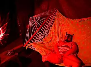 Amateur BBW fingering her wet pussy in a tent hammock