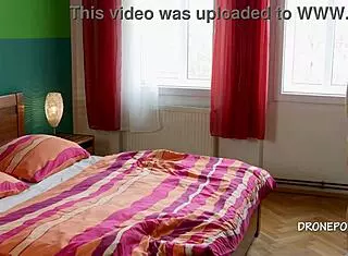 Redhead Casey endures nipple clamps in bondage.