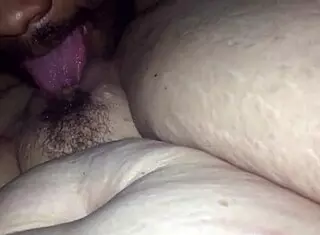 Licking pussy and ass teasingly.