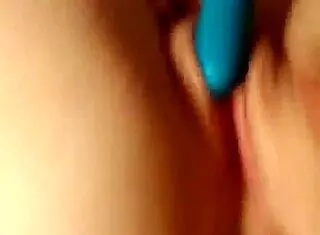 candii rose plays with her dildo, getting wet and reaching orgasm in a homemade session