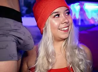 Horny blonde sucks her boyfriend's cock in public while wearing boxers