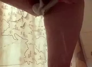 i'm laina marie and i masturbate with the shower head in the bath, squirting everywhere