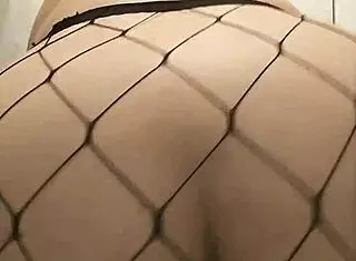 chubby gal rides dildo in fishnets, exploring her bbw body