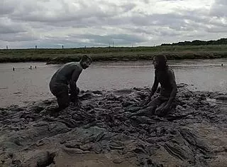 Mud wrestling: who wins, women or man in wet mess?