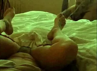 Amateur tattooed couple enjoys homemade activities together in their home