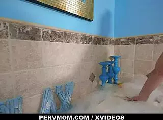 Blonde milf lets stepson's big cock slide into her big titties