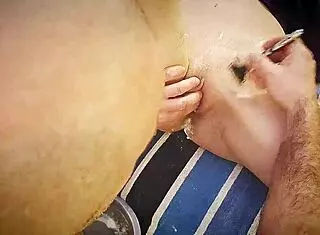 She gently shaves her smooth pussy for the fetish scene