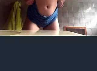 Blonde Girl Records Herself in Bathroom Webcam Solo Session