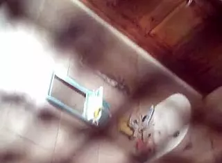 someone secretly watches in the bathroom that evening