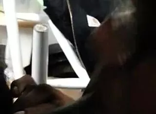 Ebony babe sucks black cock with glasses