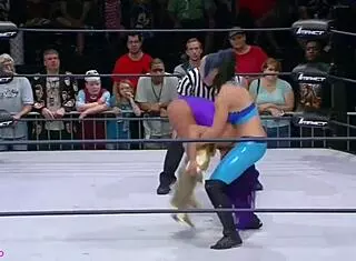 Gabi Castrovinci and Raquel wrestle in the garage with extra moves