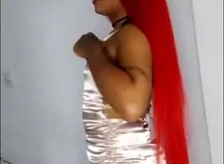 Beautiful Latina Transsexual Prepares for Video Shoot