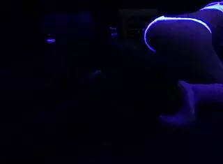 Scarlett Johnson Engages in Blacklight Sex with Fetish Elements