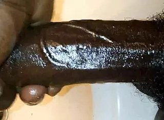 Massive Black Monster Cock with Prominent Veins Ready for Action