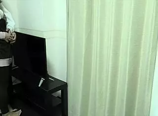 young amateur japanese couple having sex in the living room before komoga gets home from school