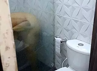 I surprise this sexy redhead milf licking her mature pussy in the bathroom