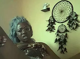 Nae in bed fingering her twat!