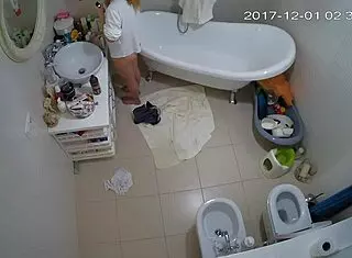 Smart amateurs engage in shaved masturbation under voyeur watch