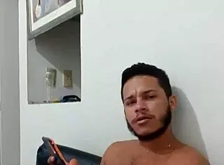 Young well-endowed guy masturbating nicely