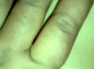 fingering her wet pussy while thinking of big cocks