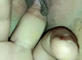 fingering her wet pussy while thinking of big cocks
