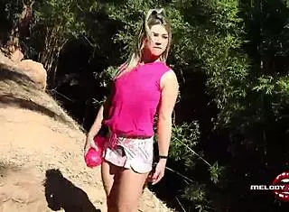 Hot Blonde Melody Antunes Rests in Park After Sweaty Red Outfit