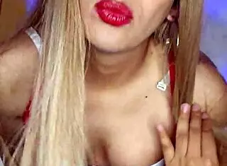 beautiful made-up transvestite shows off her stunning look!